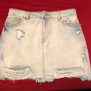 Blue destroyed denim skirt